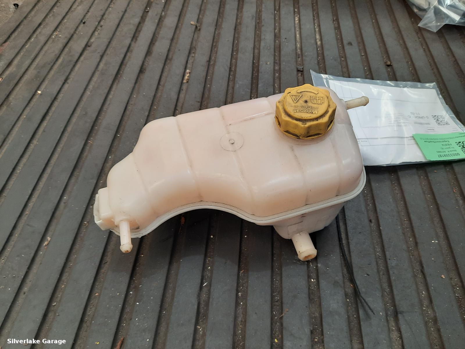 View Auto part Overflow Bottle FORD FIESTA 2001